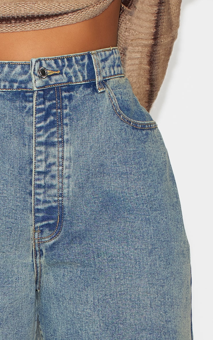 https://cdn-img.prettylittlething.com/4/e/c/8/4ec89ded99883d54bed1a860772e8722b29ac7f1_CNL5817_4_plus_vintage_wash_boyfriend_jeans.jpg