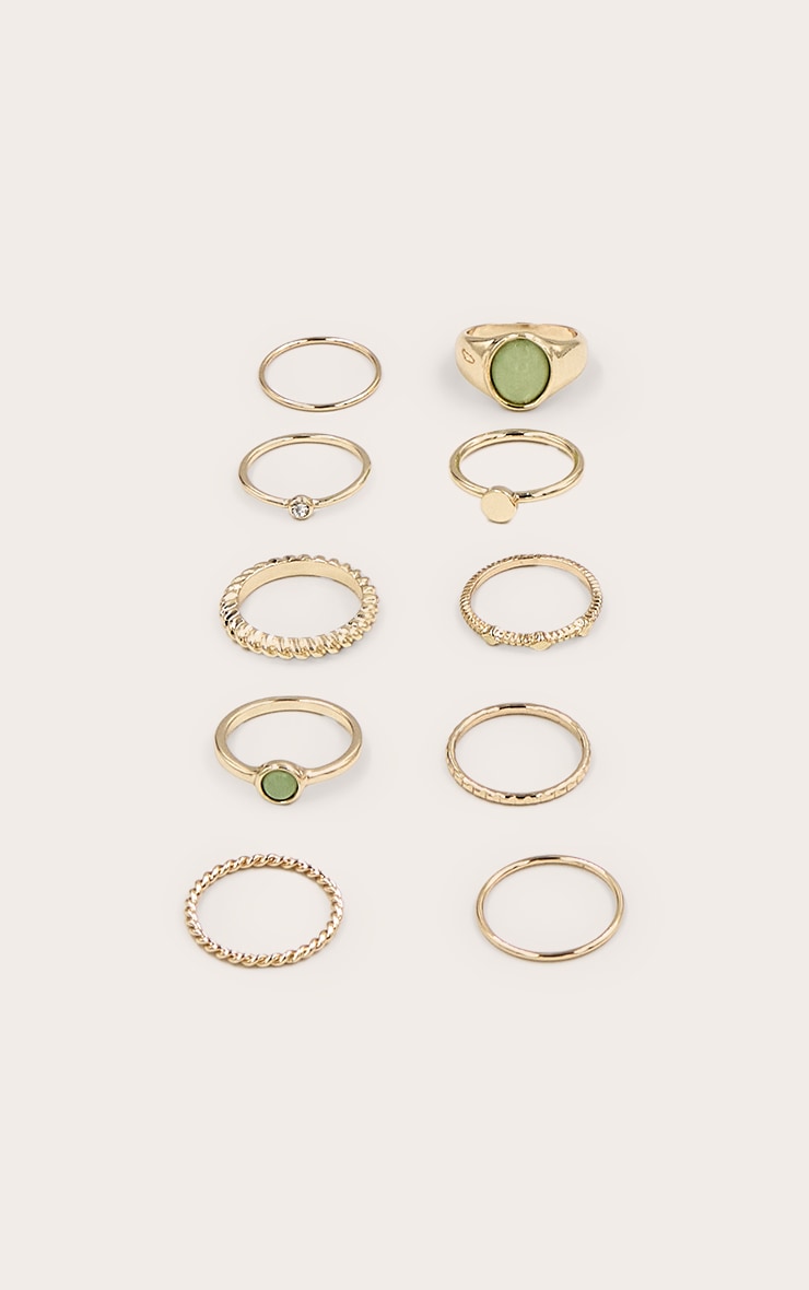 https://cdn-img.prettylittlething.com/8/6/1/6/861641986a54094e908639997cbfd9435c78a5d7_CNN0366_2_gold_texture_resin_ring_multi_park.jpg