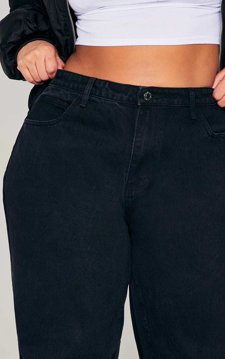 https://cdn-img.prettylittlething.com/9/b/b/8/9bb894cbf68b6b27f98ebaebd60a89e7360538d2_CNB8796_4_plus_black_high_waist_faded_boyfriend_jeans.jpg