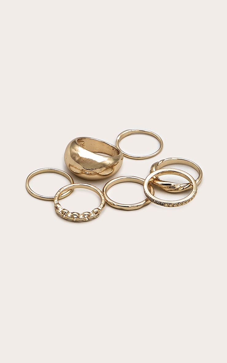 https://cdn-img.prettylittlething.com/a/4/b/6/a4b64e4feea9f1d22e141f4ae9adc8facca5cf92_CNL6220_2_gold_assorted_diamante_textured_multipack_rings.jpg