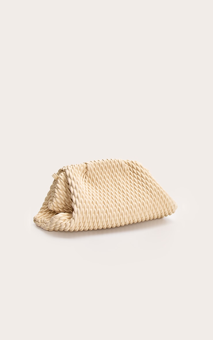 https://cdn-img.prettylittlething.com/c/2/1/5/c215ebeba17e0b3bfb9e9a55bcd062322ec59c41_CNN4454_3_butter_yellow_soft_pu_weave_clutch_bag.jpg