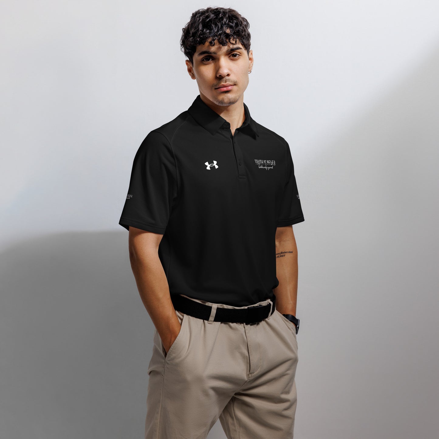 Truth is Never Hidden Under Armour® men's polo