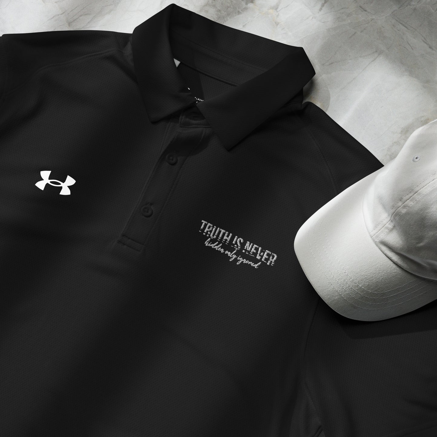 Truth is Never Hidden Under Armour® men's polo